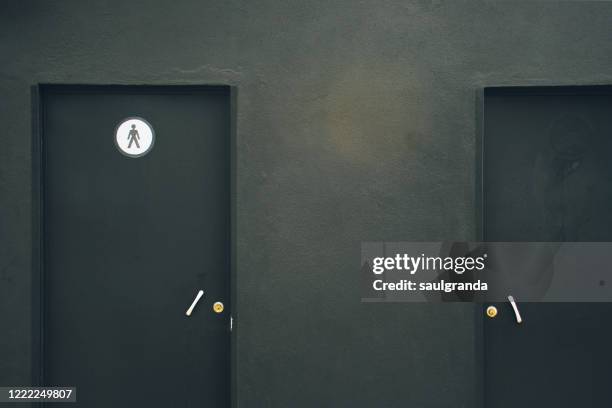 black toilet doors - bathroom door ストックフォトと画像