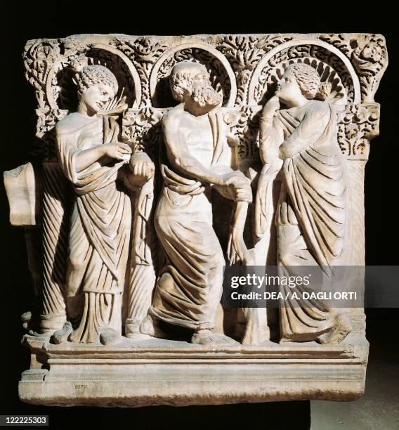 Roman civilization, 3rd century A.D. Relief from a Asiatic sacrophagus depicting a poet standing between two muses.