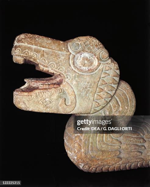 Maya civilization, Mexico, 11th century A.D. Feathered snake head in stone. From Chichen Itza.