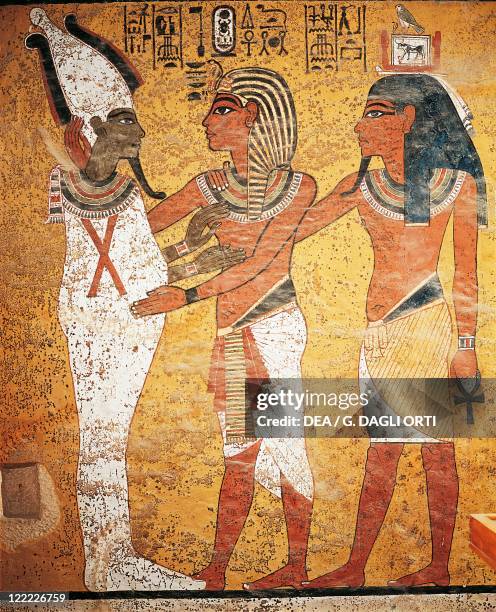 Egypt - Luxor - Thebes - Valley of the Kings, Tutankhamen's Tomb. Detail of the frescos: The King accompanied into the afterlife by Osiris .