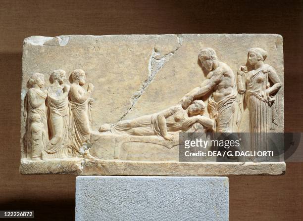 Greece - 5th century b.C. - Marble relief. Asclepius or Hippocrates treating ill woman.