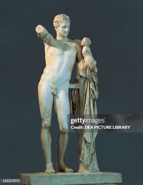 Greek civilization, 4th century b.C. Praxiteles , Hermes and the infant Dionysus, marble, h.2.13 m. From the Temple of Hera at Olympia.