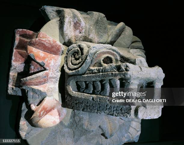Mexico - Surroundings of Mexico City - Pre-Columbian civilization of Teotihuacan - Pyramid of Quetzalcoatl - Stone statue in the shape of serpent...