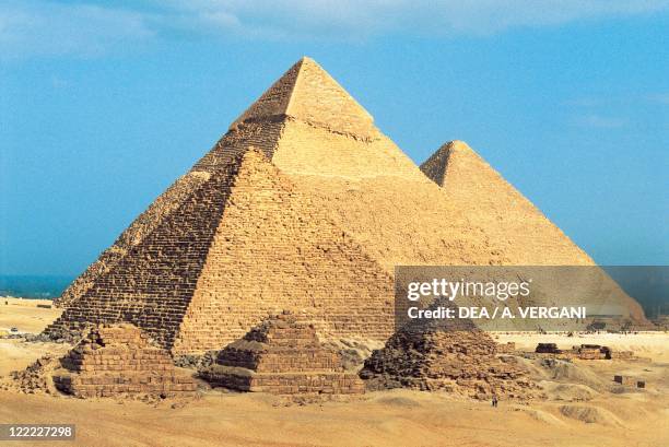 Egypt - Cairo - Ancient Memphis . Pyramids at Giza. Pyramid of Khafre , Menkaure and Khufu .