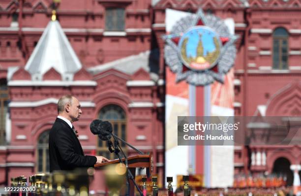 Russian President Vladimir Putin delivers a speech during the Victory Day military parade in Red Square marking the 75th anniversary of the victory...