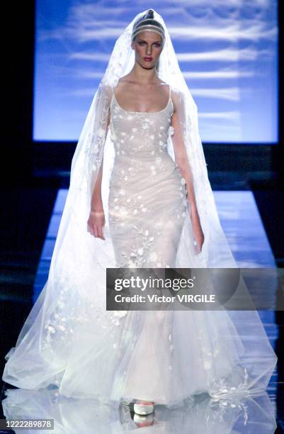 Model walks the runway during the Elie Saab Haute Couture Fall/Winter 2000-2001 fashion show as part of the Paris Haute Couture Fashion Week on July...