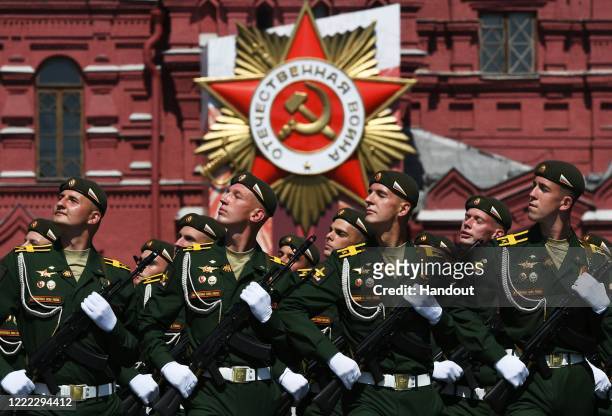 Parade unit servicemen march during the Victory Day military parade in Red Square marking the 75th anniversary of the victory in World War II, on...