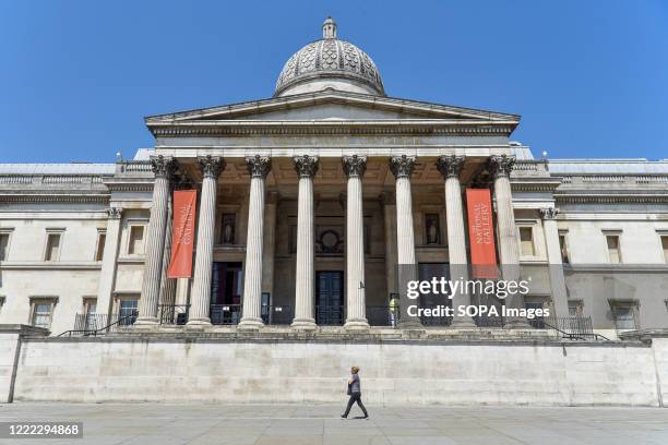 Woman walks past the National Portrait Gallery seen on the day British Prime Minister Boris Johnson announced museums & galleries can reopen in...