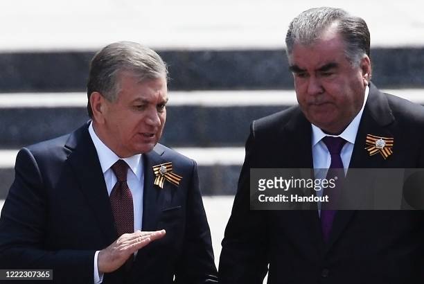 President of Uzbekistan Shavkat Mirziyoyev and President of Tajikistan Emomali Rahmon take part in the flower-laying ceremony at the Tomb of the...