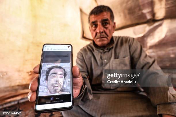 Syrian citizen Ismail Elhany from Idlib, father of Muhammad who was tortured and killed after detained by Assad Regime forces in 2011, speaks during...