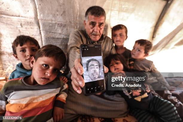 Syrian citizen Ismail Elhany from Idlib, father of Muhammad who was tortured and killed after detained by Assad Regime forces in 2011, speaks during...