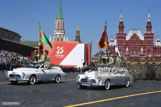 Turkmenistan servicemen march during the Victory Day military parade in Red Square marking the 75th anniversary of the victory in World War II, on...