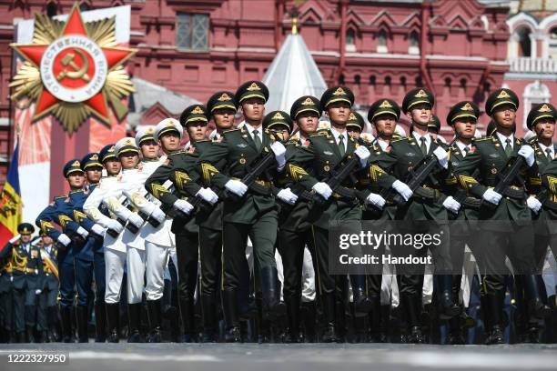 Servicemen of the Chinese Armed Forces march during a Victory Day military parade in Red Square marking the 75th anniversary of the victory in World...