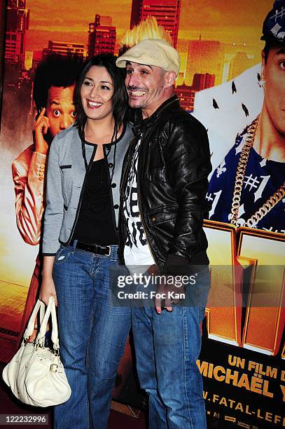 Hosts Karima Charni from W9 and Cartman attend the 'Fatal' Paris Premiere at Le Grand Rex on June 14, 2010 in Paris, France.