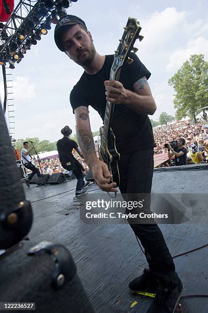 Alex Levine, Brian Fallon and Alex Rosamilia of The Gaslight Anthem perform onstage during Bonnaroo 2010 at Which Stage on June 11, 2010 in...