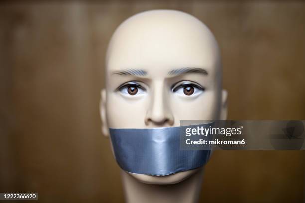 mannequin dummy head with taped mouth - gagged stock pictures, royalty-free photos & images