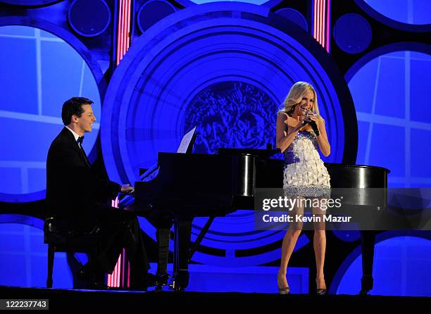 Sean Hayes and Kristen Chenoweth performs onstage during the 64th Annual Tony Awards at Radio City Music Hall on June 13, 2010 in New York City.