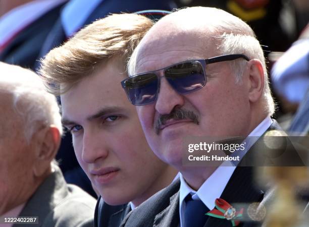 President of Belarus Alexander Lukashenko with his son Nikolai during the Victory Day military parade marking the 75th anniversary of the victory in...