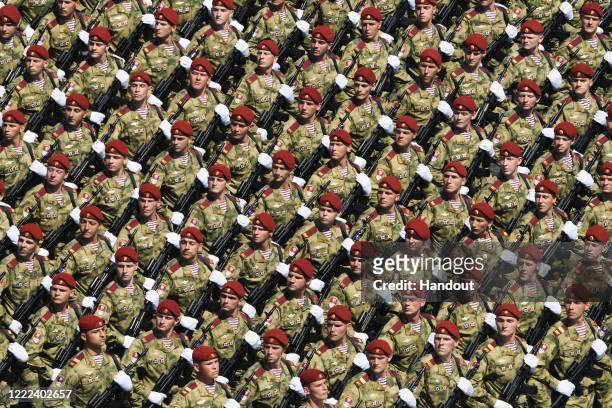 Battalion of the National Guard march during a Victory Day military parade in Red Square marking the 75th anniversary of the victory in World War II,...
