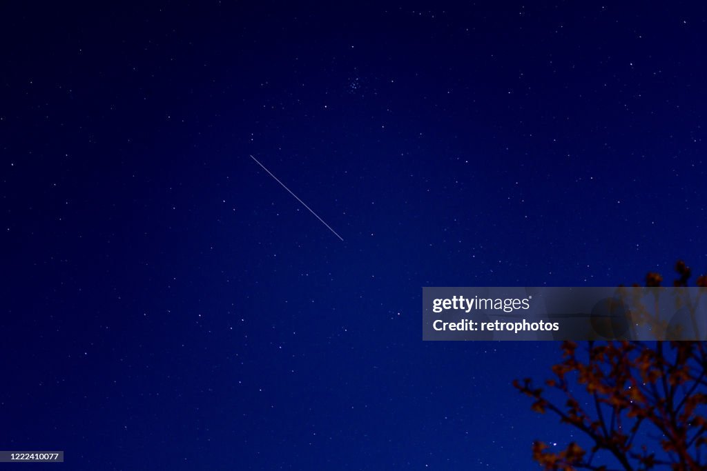 Falling Star Infront Falling Star In The Dark Night High-Res Stock Photo - Getty Images
