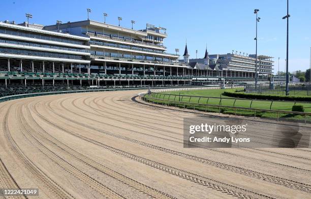 View of the twin spires and empty grandstand from the first turn at Churchill Downs on May 02, 2020 in Louisville, Kentucky. The 146th running of the...