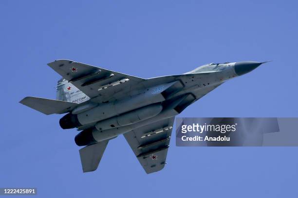 MiG-29 short-range jet fighter aircrafts perform during Victory Day in Red Square in Moscow, Russia on June 24, 2020. Victory Day parades,...