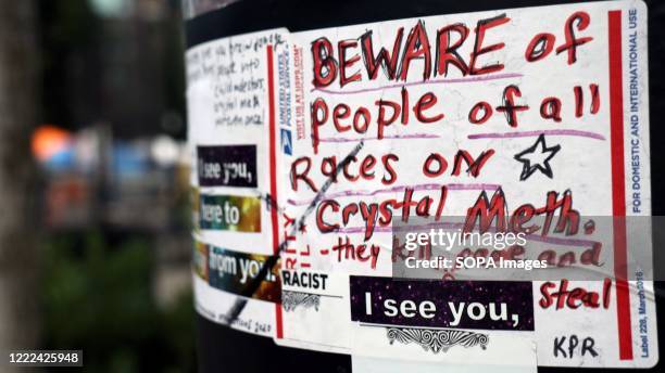 Sign warns of murderers, drug users and rapists purportedly preying on residents of the so-called Capitol Hill Occupied Protest zone in Seattle....