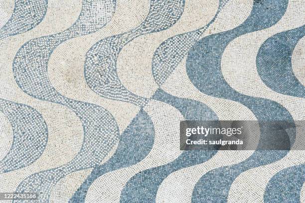 aerial view of decorated cobblestone in lisbon - gerafft stock-fotos und bilder