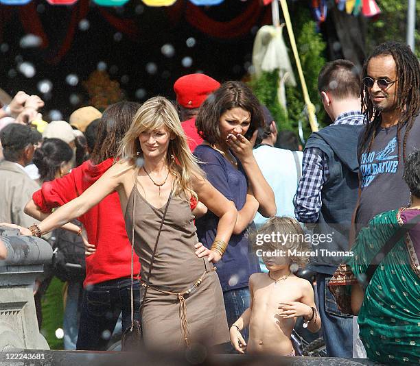 Tennis great Yannick Noah and wife Isabelle Camus are seen with son Joalukas Noah in Washington Square Park on June 12, 2010 in New York, New York.