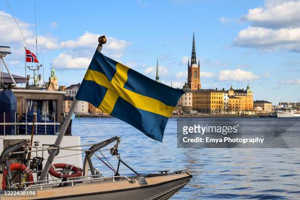 view of gamla stan old town from harbor of stockholm, sweden - stockholm stock pictures, royalty-free photos & images