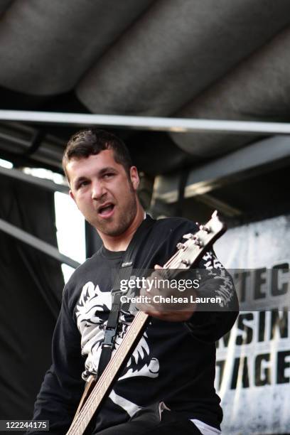 Bassist Mark Davis of Emmure performs at The VANS Warped Tour at Seaside Park on June 27, 2010 in Ventura, California.