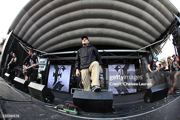 Guitarist Mike Mulholland, bassist Mark Davis, vocalist Frankie Palmeri and guitarist Jesse Ketive of Emmure perform at The VANS Warped Tour at...