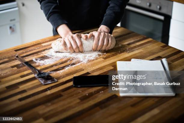 kneading bread dough from wholemeal wheat / wholewheat flour - rolling stock pictures, royalty-free photos & images