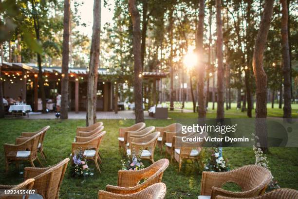 the location of the wedding ceremony at sunset in the open air - wedding ceremony seats stock pictures, royalty-free photos & images