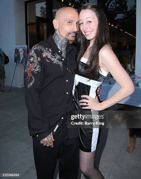 Actor Robert LaSardo and Danielle Kasen attend Venice Magazine's event at the opening of Haro Gallery on June 9, 2010 in Culver City, California.