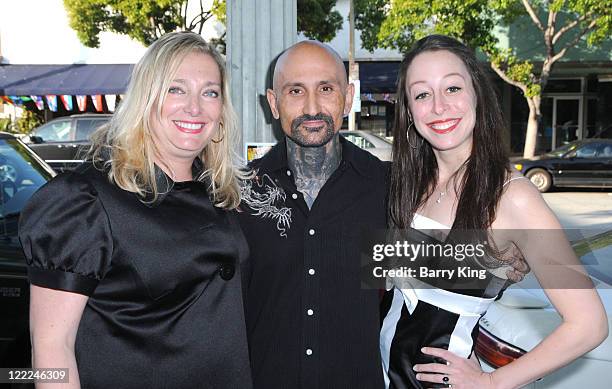 Venice Magazine's Paige Petrone, actor Robert LaSardo and Danielle Kasen attend Venice Magazine's event at the opening of Haro Gallery on June 9,...