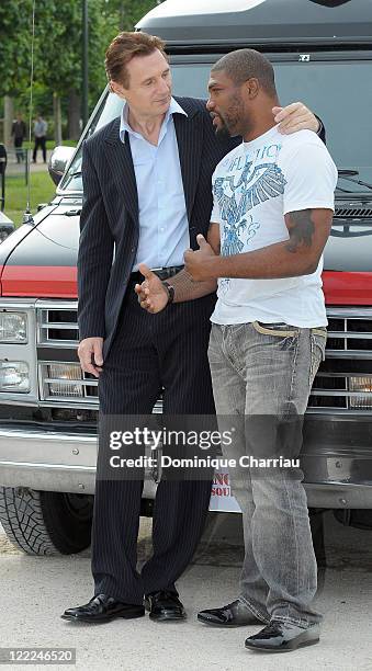 Actor Liam Neeson and Quinton 'Rampage' Jackson attend "L'agence Tous Risques" Paris Photocall at the Champs de mars on June 14, 2010 in Paris,...