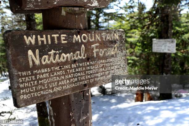 View of a trail sign White Mountain National Forest on May 02, 2020 in Franconia, New Hampshire. Most New Hampshire State Parks have remained open...