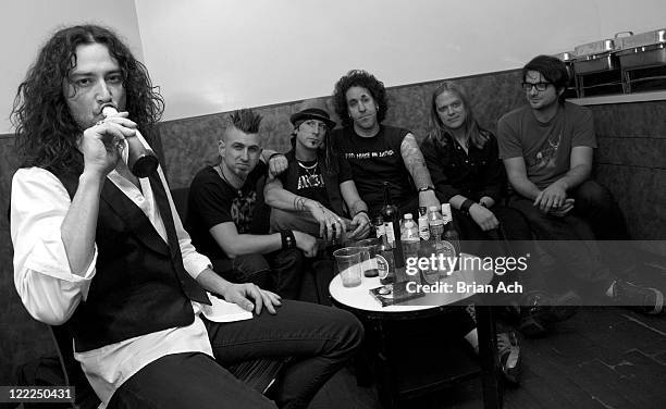 Constantine Maroulis and his band pose for a portrait before they perform A Night At The Rock Show at Highline Ballroom on June 16, 2010 in New York...