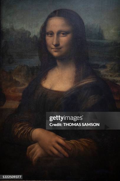 Picture taken on June 23, 2020 shows detail of the Italian artist Leonardo da Vinci's "Mona Lisa" also known as La Gioconda at the Louvre Museum in...