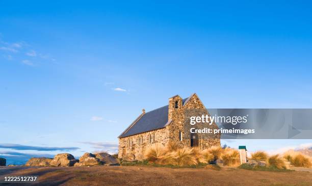 beautiful morning at church of the good shepherd and lake tekapo, new zealand - church of the good shepherd tekapo stock pictures, royalty-free photos & images