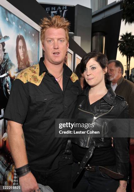 Musician Josh Homme of Queens of the Stone Age and wife musician Brody Dalle of The Distillers attend the "Jonah Hex" Los Angeles premiere held at...