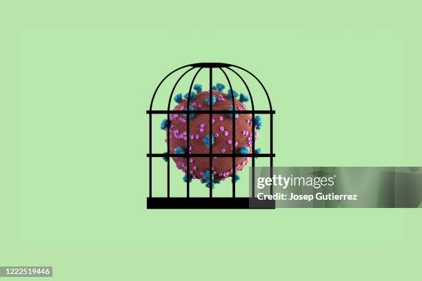 coronavirus quarantine concept. covid-19 virus inside a cage - cage stock pictures, royalty-free photos & images