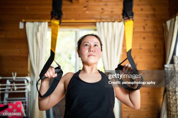 exercise at home - suspension training stock pictures, royalty-free photos & images