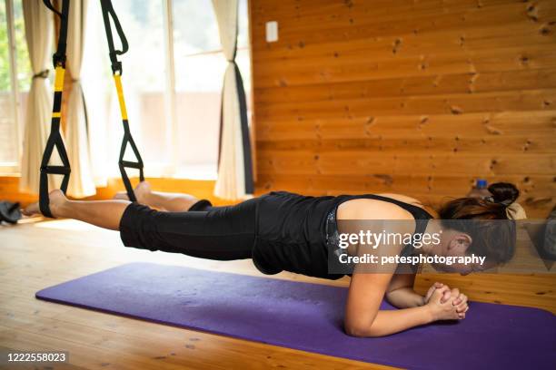 exercise at home - suspension training stock pictures, royalty-free photos & images