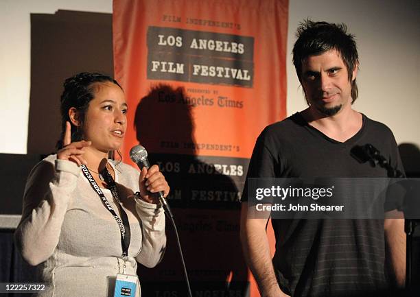 Programmer Christine Davila and director Ernesto Diaz Espinoza speak onstage during the "Mandrill" Q&A during the 2010 Los Angeles Film Festival at...