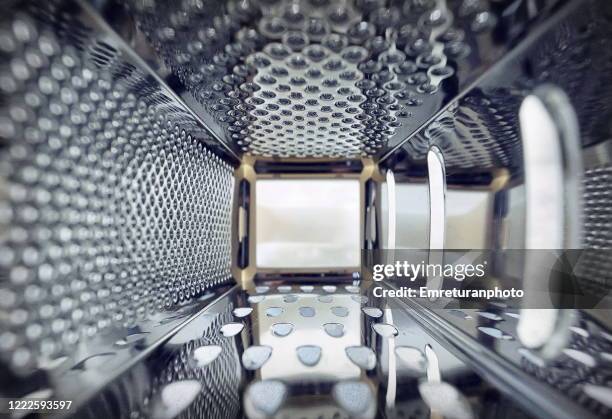 inner view of a steel grater in the kitchen. - emreturanphoto stock pictures, royalty-free photos & images