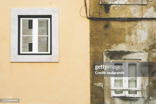 old facades with two windows - steinhaus stock-fotos und bilder