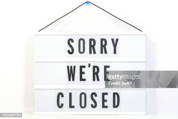 sorry we are closed - hanging sign - fotografias e filmes do acervo