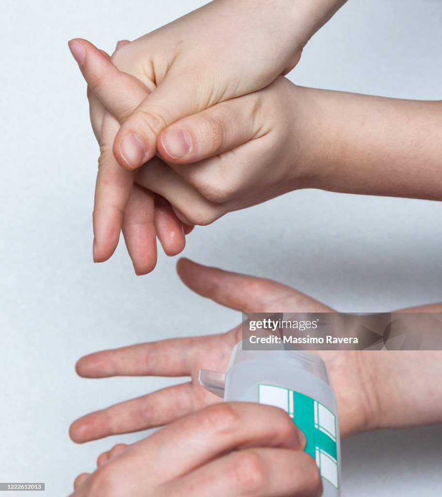 Hand Subitize Sanitizing Hands High-Res Stock Photo - Getty Images